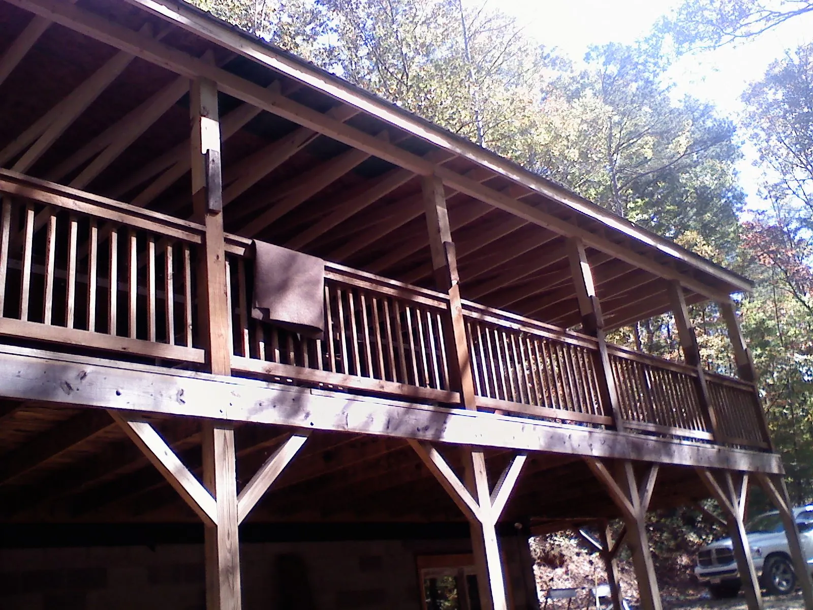 Timber framing under a new elevated porch and deck — Roof Leak Repair in Smithville by Roofing Brothers